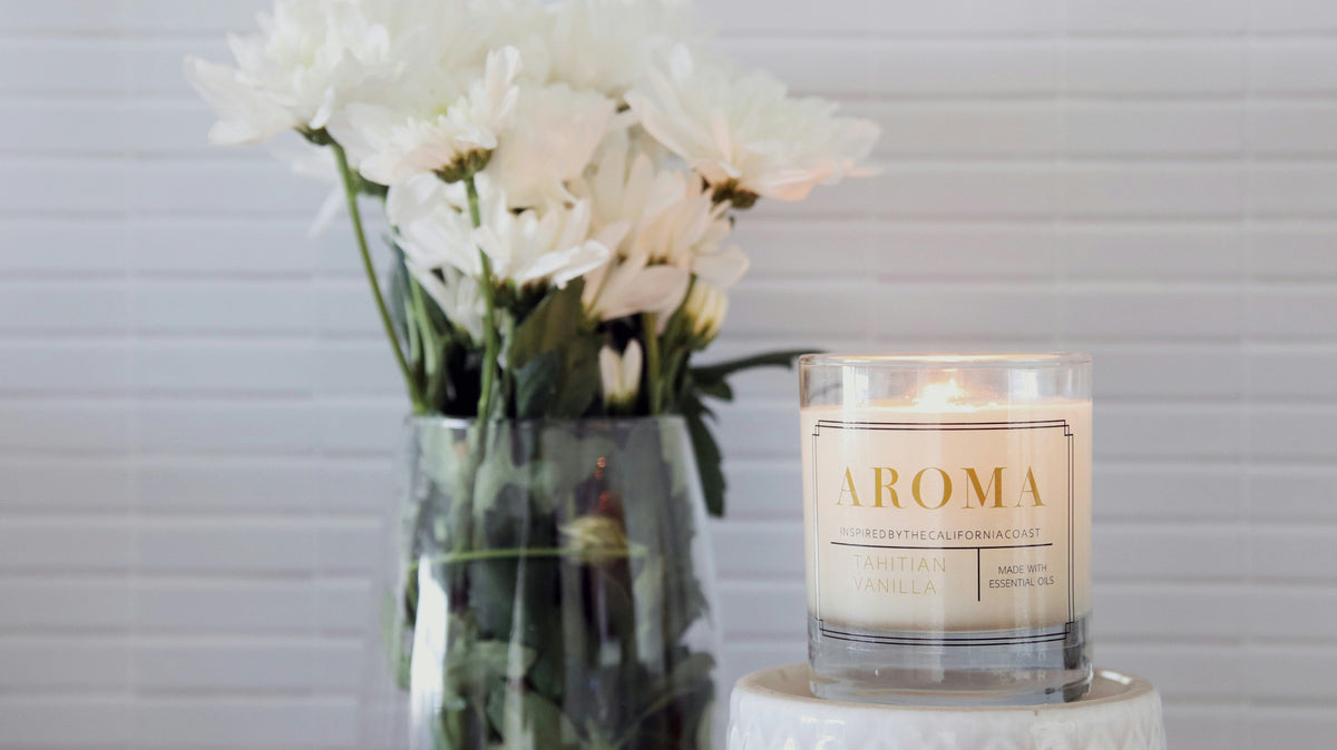 Pivlox luxury home fragrance — hand-poured candles and reed diffusers styled in a calm British interior